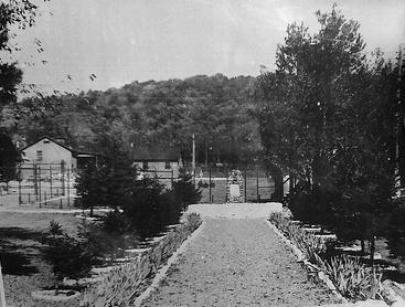 Entrance to POW camp with CCC Fountain